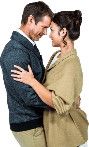 Capture of loving couple embracing closely while exchanging affectionate glances. Their intimate moment reflects warmth and joy, ideal for promoting themes of romance and intimate relationships in marketing materials, websites, or valentine campaigns, fostering an emotional connection with the audience.