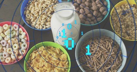 Glass milk bottle surrounded by assorted cereal bowls with futuristic binary overlay