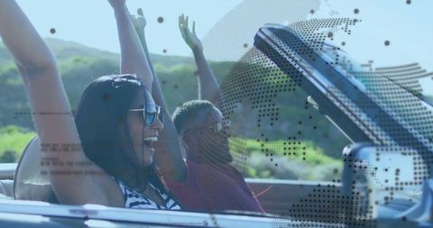 Joyful Road Trip in Convertible Car Under Sunny Skies