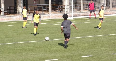 Youth Soccer Practice Focusing on Team Building and Physical Fitness