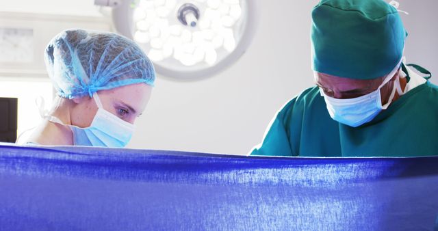 Medical Team Conducting Surgery in Sterile Environment - Download Free Stock Images Pikwizard.com