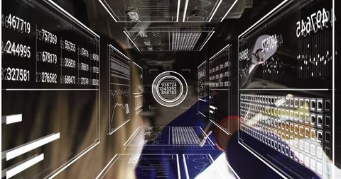 Female technician interacting with holographic data hud in futuristic control corridor