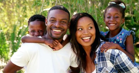 Smiling African American Family Outdoors on Sunny Day - Download Free Stock Images Pikwizard.com