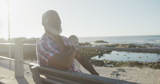 Senior Man with Gray Beard Enjoying Ocean View from Park Bench - Download Free Stock Images Pikwizard.com