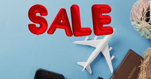 Travel Sale Concept with Plane and Accessories on Blue Background - Download Free Stock Images Pikwizard.com