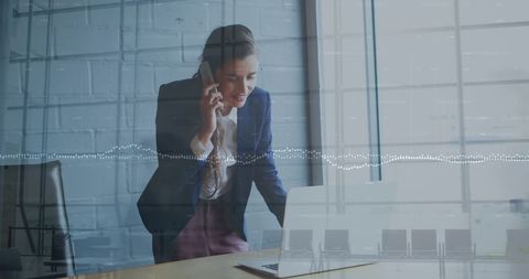 Businesswoman discussing innovative strategies in digital age office