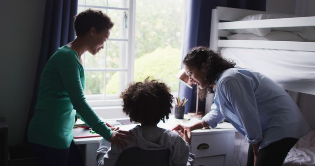 Parents Helping Child With Homework in Cozy Bedroom - Download Free Stock Images Pikwizard.com