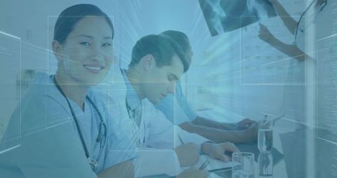 Medical Team in Blue Scrubs Embracing Digital Healthcare Technology