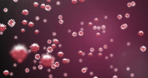 Floating Covid-19 Cells on Dark Red Background Symbolizing Pandemic