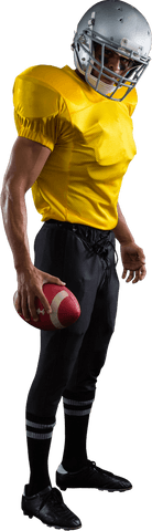 American football player holding ball wearing yellow jersey transparent background