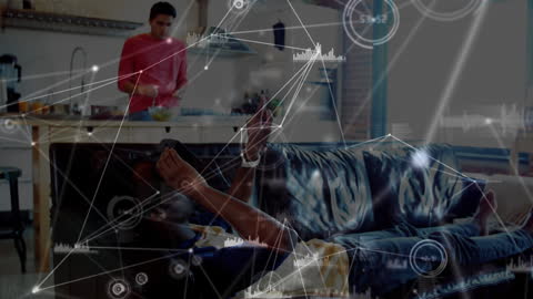 Diverse Men Using VR Headset with Interactive Data Visualization at Home