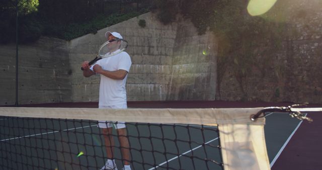 Man Practicing Tennis on Outdoor Court - Download Free Stock Images Pikwizard.com