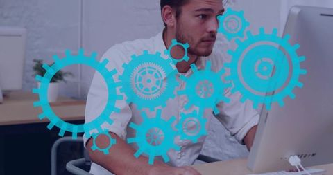 Professional typing at desktop with blue gear overlay for software engineering workflow