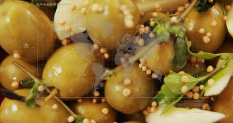 Futuristic culinary presentation of olives and herbs