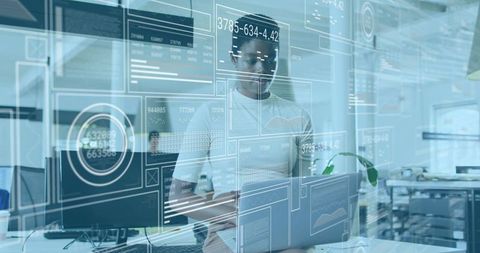 Woman Analyzing Holographic Data Dashboards in Modern Office Workspace