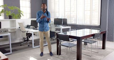 Professional Businessman Presenting in Modern Office