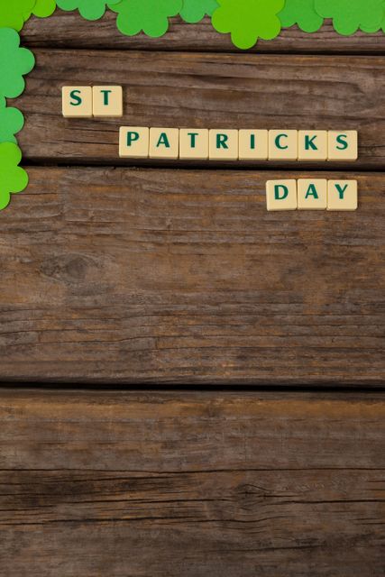 Perfect for promoting St Patrick's Day events, creating festive invitations, or decorating social media posts. The rustic wooden background and shamrocks add a traditional Irish touch, making it ideal for holiday-themed designs and advertisements.