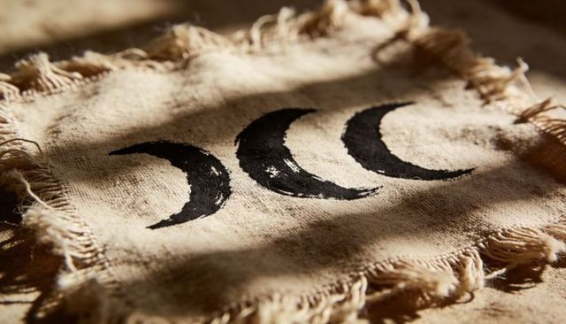 Triple crescent moon on frayed linen textile rustic boho moon phase decor