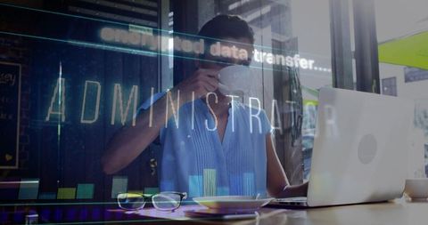 Sipping coffee while accessing holographic admin interface on laptop at cafe window