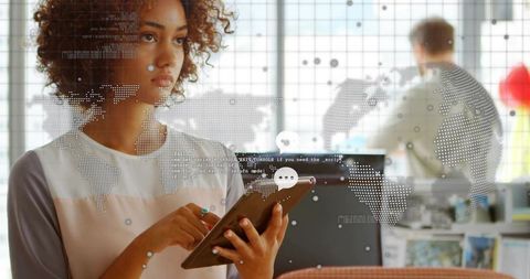 Young professional analyzing global data on tablet with augmented analytics overlay