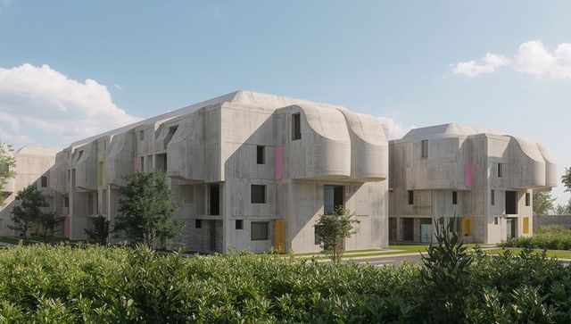 Sculpted concrete residential complex featuring curved facades, color accents and green courtyards