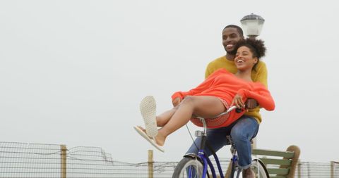 Romantic Couple Enjoying Playful Bike Ride