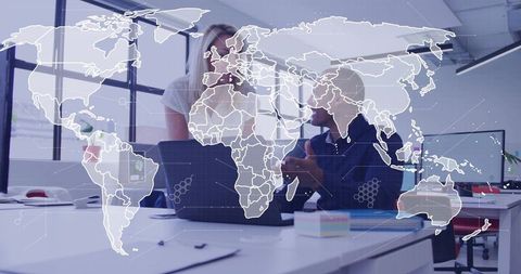 Collaborating on Global Business and Team Brainstorming with World Map Overlay