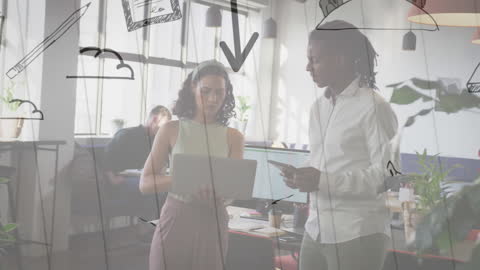 Creative Professionals Collaborating on Digital Project in Modern Office