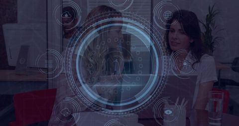 Collaborating over circular digital interface hud in modern office meeting