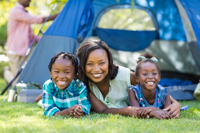 Happy African American Family Camping Outdoors - Download Free Stock Photos Pikwizard.com