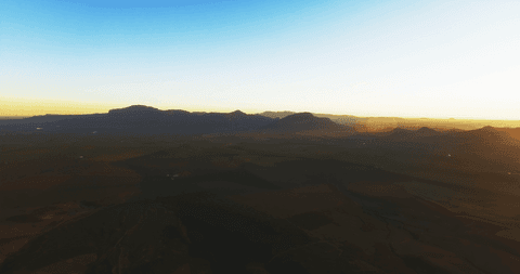 transparent blue sky over quiet countryside at sunset - Download Free Stock Videos Pikwizard.com