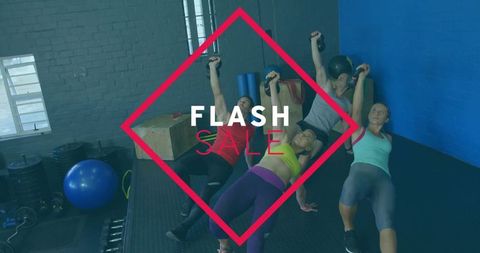 Group holding kettlebells performing glute bridge presses in fitness studio during flash sale