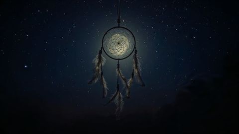 Ethereal Dreamcatcher Silhouetted Against Starry Night Sky
