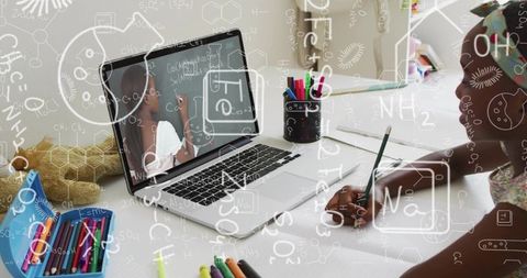 Student engaged with virtual chemistry lesson amidst science symbols