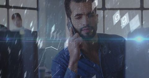 Professional man using smartphone with data overlays in modern office