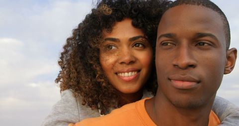 Joyful African American Couple Embracing on Beach - Download Free Stock Images Pikwizard.com