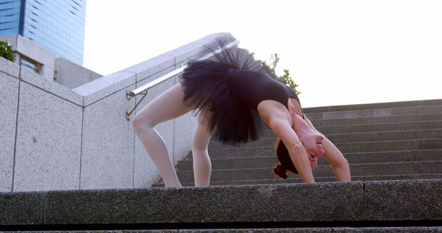 Flexible Ballerina Practicing Bridge Pose on City Steps - Download Free Stock Images Pikwizard.com