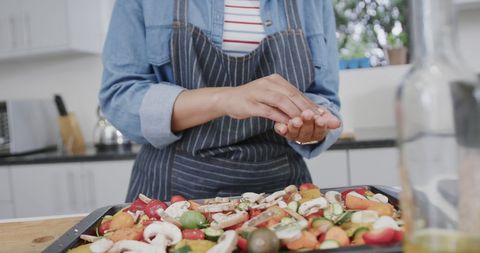 Woman Preparing Mixed Vegetables in Relaxing Home Kitchen