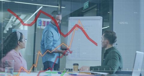 Team Analyzing Financial Graphs with Data Overlay for Strategy Presentation in Modern Office