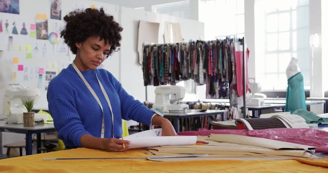 Fashion Designer Working on Clothing Patterns in Design Studio - Download Free Stock Images Pikwizard.com