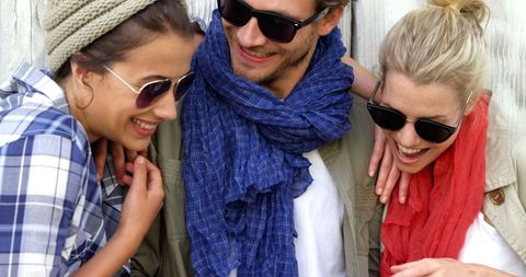 Group of Friends Enjoying Leisurely Day Outdoors with Smiles