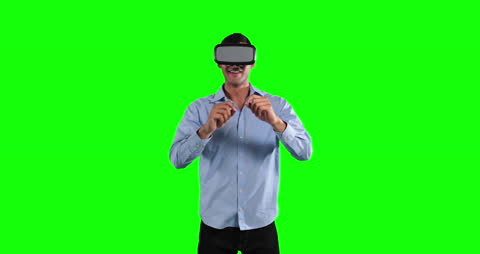 Man Wearing VR Goggles on Green Screen