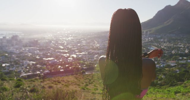 Woman Overlooking Scenic Cityscape with Mountain View - Download Free Stock Images Pikwizard.com