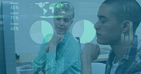 Diverse Colleagues Discussing Business Data Analytics in Modern Office