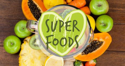 Healthy Superfoods Background with Mixed Fruits Arrangement