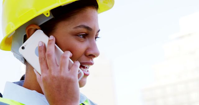 Female Engineer Talking on Smartphone at Construction Site - Download Free Stock Images Pikwizard.com