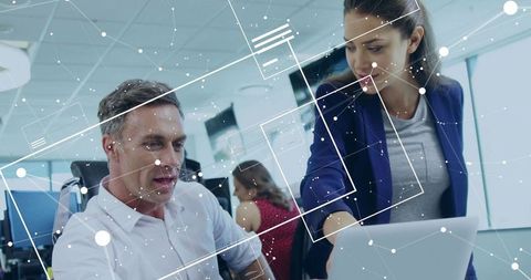 Modern Professional Collaboration in Open-Plan Office Workspace