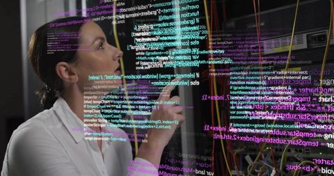Analyst Examining Code Displayed on Transparent Interface in Data Center