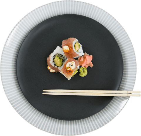 transparent sushi roll with chopsticks on modern black plate - Download Free Stock Videos Pikwizard.com
