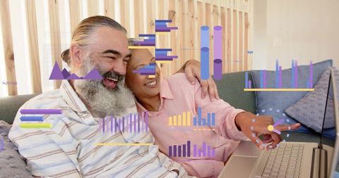 Mature Couple Viewing Laptop with AR Data Visualizations for Financial Planning at Home